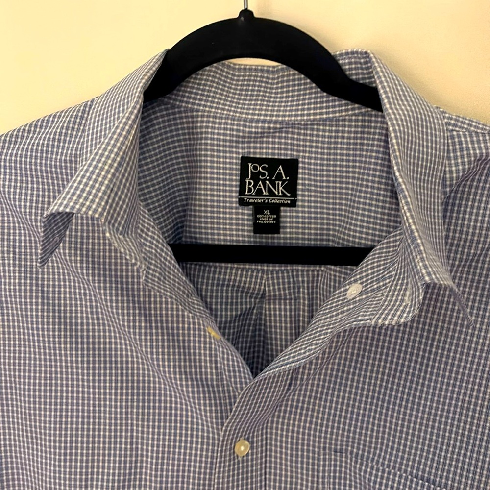 Long sleeved blue checkered button down. Size XL. Like new.